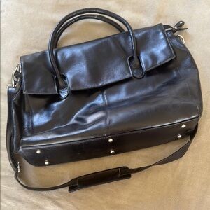 Catwalk collection leather handbag in a 
Black tote or laptop / overnight bag
